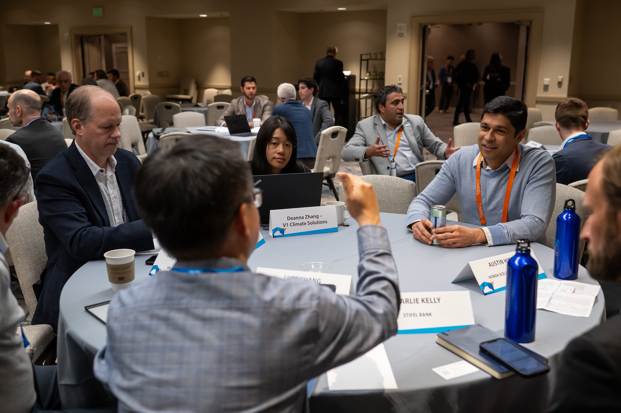 people seated at table talking