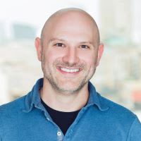 Headshot of Logan Grizzel from MUUS Climate Partners
