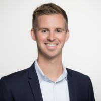 Headshot of Conor Battle from Spring Lane Capital
