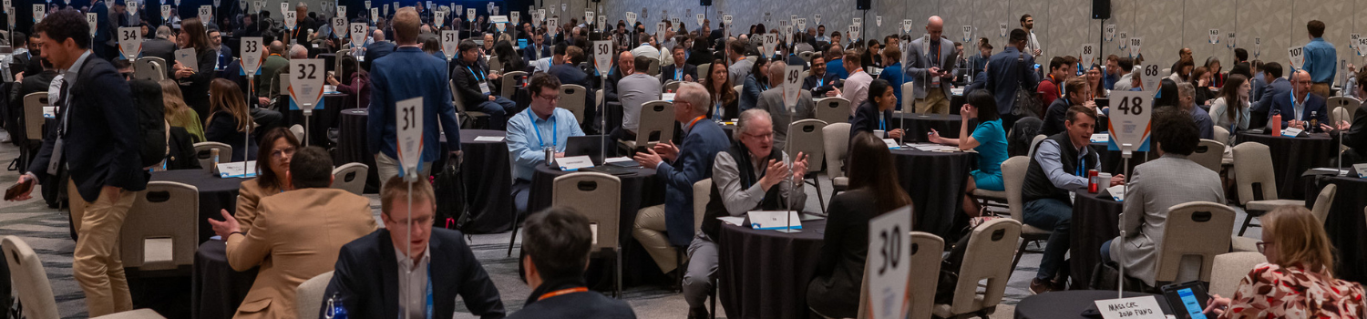 crowded room of people talking