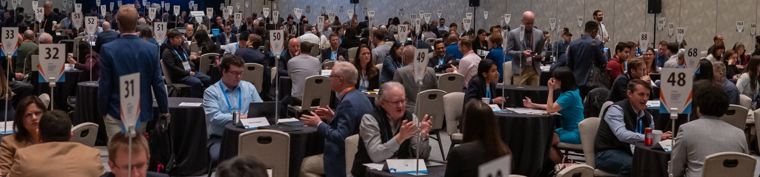 crowded room of people talking